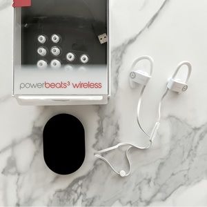 Beats by Dre Powerbeats3 wireless earphones with carrying case.